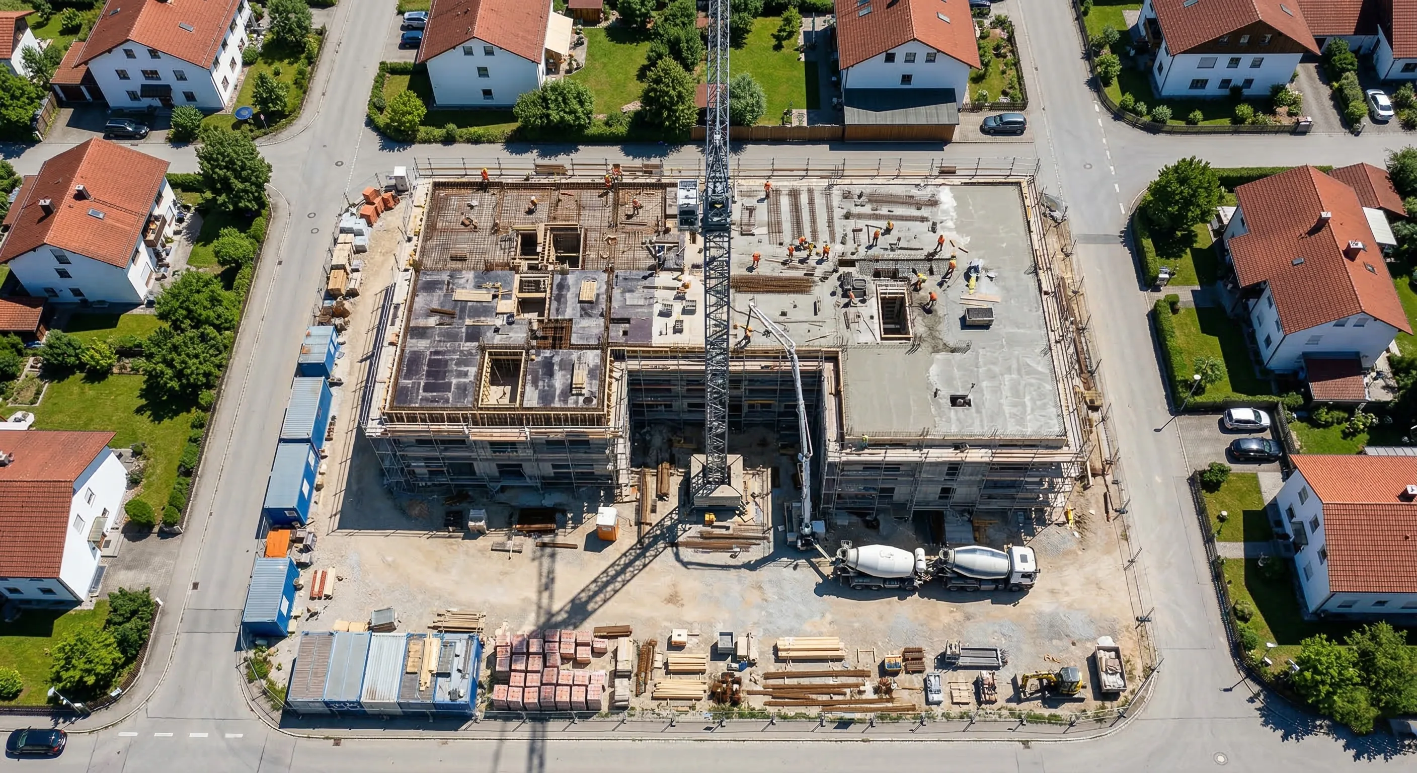 Luftaufnahme einer Wohngebiet-Baustelle für Baufortschrittsdokumentation per Drohne